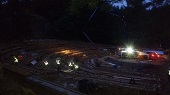 Night shot of setting up forms for another pour of benches.